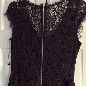 Plum coloured lace, knee length, fitted dress. Perfect for weddings & showers